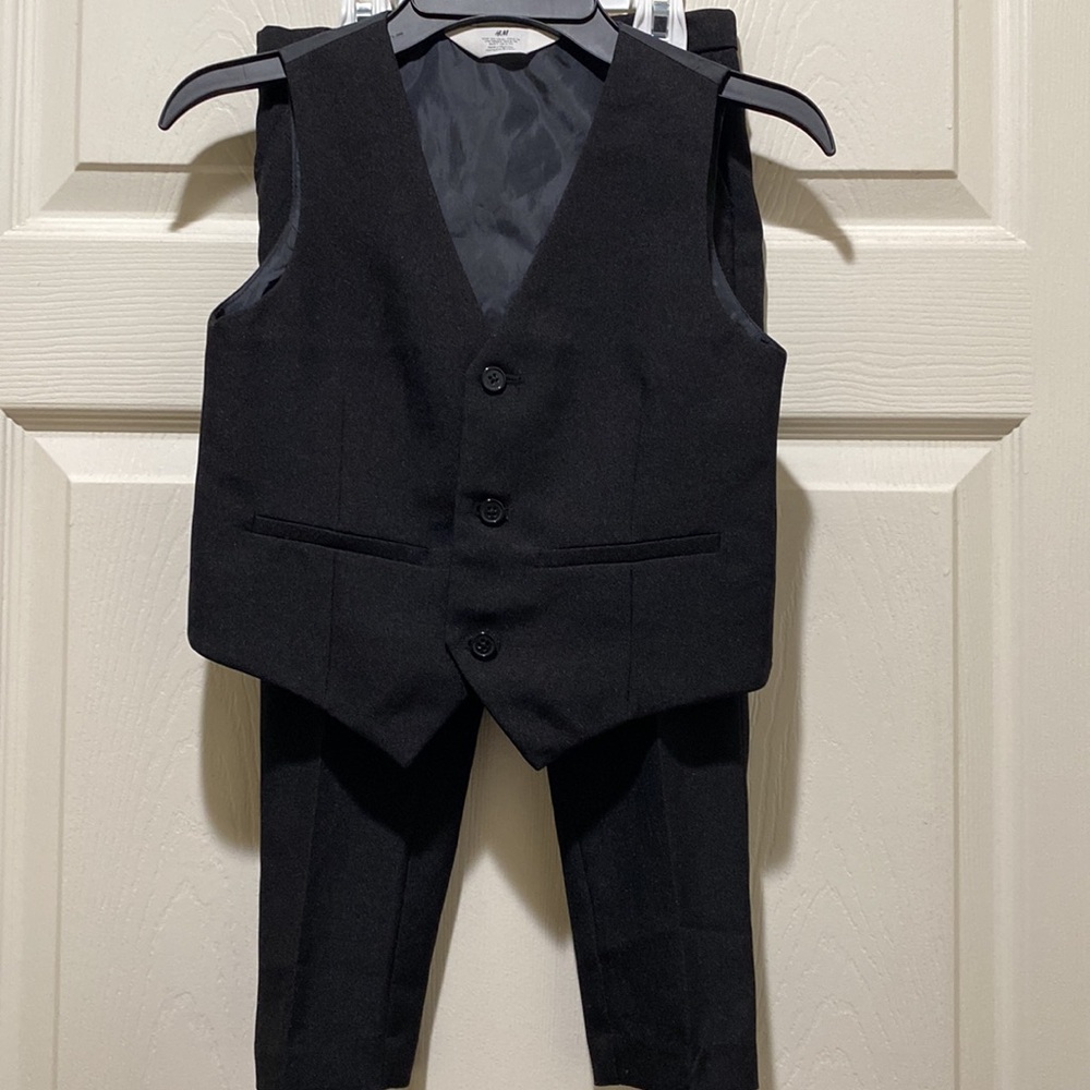 Boys special occasion vest size 6 and dress slacks size 4T in black.